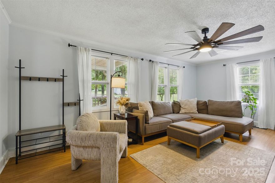 NO HOA! ***Assumable 3.99% ANNUAL PERCENTAGE RATE!** One of the lowest priced 4 bedroom, 3 FULL bathroom homes on .67 acre in the heart of Indian Land. The moment you step onto the sprawling covered front porch via accessible ramp, you will feel the warmth of country living with all the modern-day conveniences just minutes away. The porch spans the full length of this nearly 2000 sq ft home, offering a spot for morning coffee or evening relaxation. Inside, the bright, open layout creates an inviting space for everyday living and entertaining. The kitchen features a gas range, perfect for home chefs who love to cook, oak cabinets and all appliances stay — including the refrigerator, washer, and dryer! With three full bathrooms, everyone has their own space — no waiting required! The expansive lot provides plenty of space to garden, play, park your RV on concrete pad, or simply enjoy your own piece of Indian Land. HVAC replaced in 2019. Tucked away, yet convenient to award winning schools, the new Target and Costco shopping centers, and popular restaurants. Done miss this rare opportunity to own a spacious, well-appointed home with NO HOA in one of the most desirable areas around!