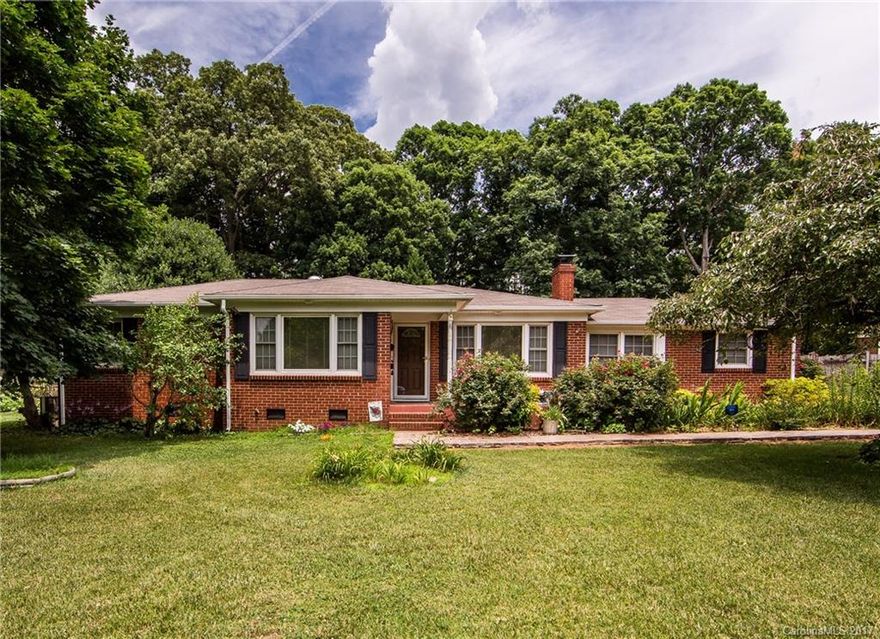 AMAZING Full Brick Ranch Home! Impressive Ranch Home centered on a generous, well landscaped 1/2 Acre with a VERY private, wooded back yard. Neighborhood convenient to I-85, I-77 and Uptown. Features well sized bedrooms and gas fireplace. Appliances convey as does generator. New Roof & Windows in 2009. HVAC and Furnace just 4 years old!Home also has a 1 car, rear entry Garage. Hardwood floors lay beneath carpet per seller. NO HOA! $697 AHS Home Warranty Included