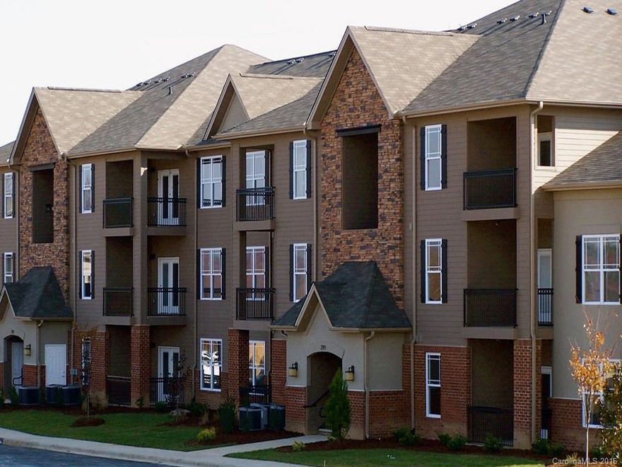 Phase II now available.  This is the Blue Ridge floor plan.  Standards include 42" maple cabinets, granite counter, 9' ceilings, stainless appliances, ceiling fans and LVT flooring in baths, laundry & kitchen.  The 2 buildings have elevators. Nice location for views.  Community has common area courtyard, walking trails and dog park. Model unit is at 91 Brickton Village Circle unit 102.