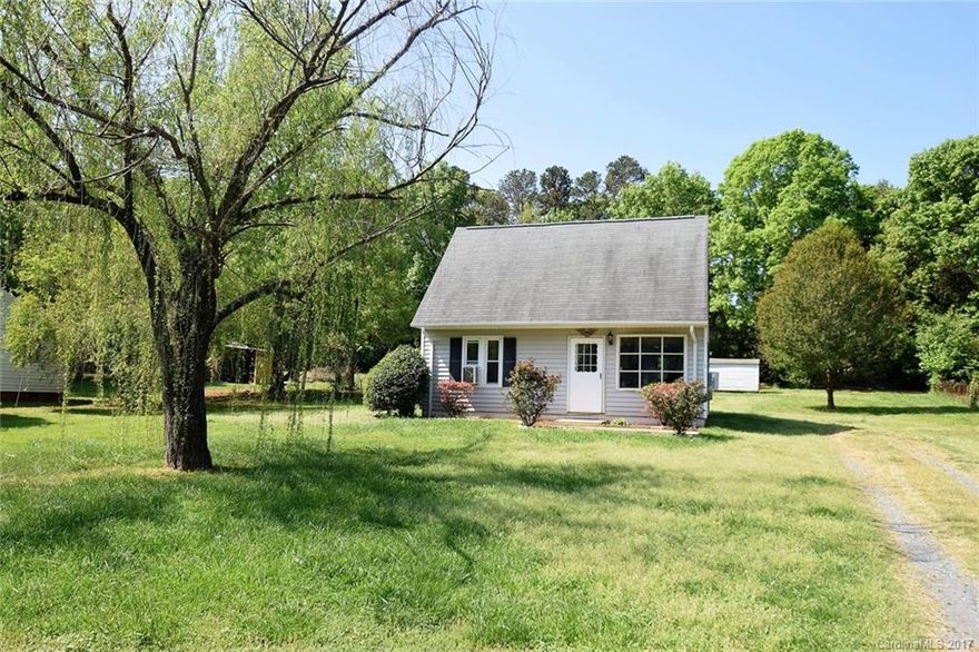 Perfect starter home on over 1/2 acre. Master bedroom on main level. New carpet and paint. 2 bedrooms up and walk in attic area. Windows & roof replaced in 2005. Refrigerator remains. Country living - great location! Close to I-485!