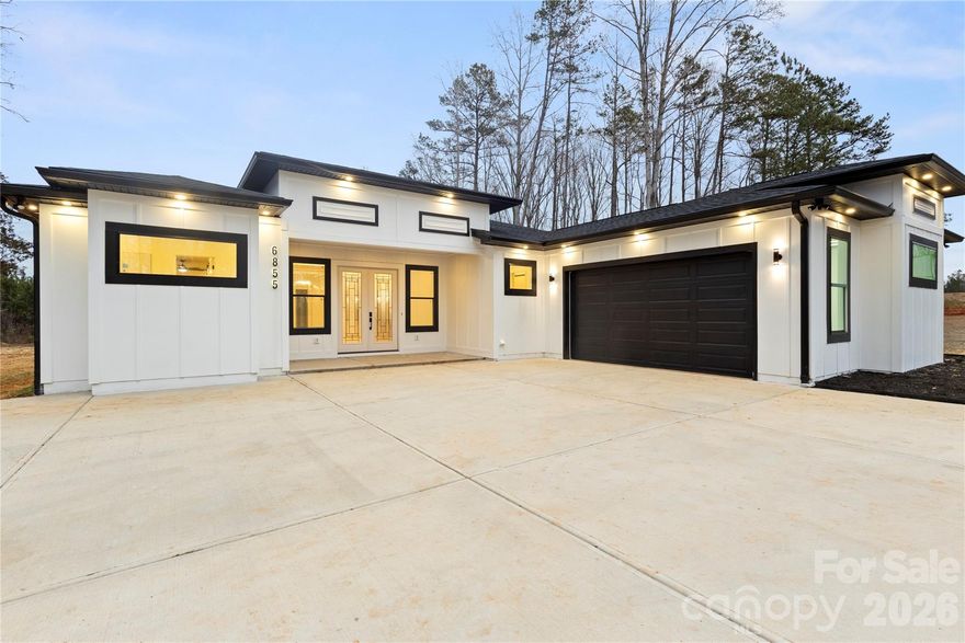 Beautiful modern new construction home in Gastonia. Just a 5 minute drive from shopping, restaurants, medical,about 10 minute drive to Lake Wylie and McDowell Nature Preserve. Amazing huge 800 square feet back porch perfect for entertaining. His and hers closets. Open space concept. Spacious garage. Generous sized bedrooms and bathrooms. No carpet in the house. Plenty outdoor space for pets. No HOA.
Real estate agent related to the builder.