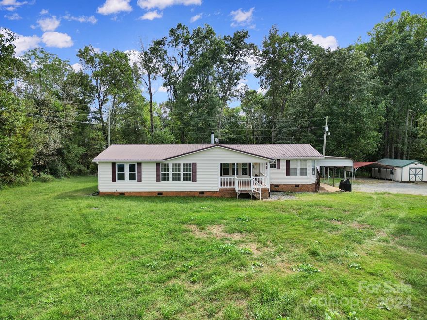 3-bedroom, 2-bathroom home nestled on 2 acres in Statesville. This property offers a peaceful, spacious setting with plenty of room to enjoy the outdoors. The home features a detached garage with additional storage space, perfect for vehicles, tools, or a workshop. Inside, you’ll find comfortable living spaces, a well-appointed kitchen, and a cozy atmosphere throughout.