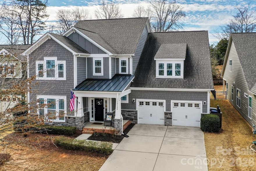 Welcome to this beautiful home located in the highly desired Avery Park neighborhood of Cornelius. Premier pedestrian-friendly community offering serene tree lined streets, playgrounds, trails, top-rated schools, and effortless proximity to Lake Norman's events and recreation. 

Enter through the two-story foyer, where soaring ceilings and abundant natural light immediately set the tone of warmth and sophistication. The heart of this exceptional home is a chef's dream, with gourmet kitchen-crafted for both everyday luxury and perfect for entertaining. Flowing seamlessly, enjoy the two-story living room and cozy fireplace with large oversized windows and abundant sunlight. Indulge in the rare luxury of a spacious primary suite on the main level, complete with easy access to your own private paradise: a sparkling in-ground swimming pool, shaded pergola, custom grilling area and cozy firepit gathering space - the ultimate setting for summer barbecues, backyard parties and cherished family gatherings year round. 

Upstairs awaits the ultimate game room retreat - a spacious, fun filled haven featuring custom sleepover beds that convey with the home, creating endless possibilities for movie nights, sleepovers, gaming marathons, or a cozy hangout space that kids (and adults) will adore.  

Don't miss your chance to live in this perfectly positioned home for an unbeatable lifestyle - conveniently close to Hough High School & Bailey Middle, neighborhood dog park, and only 0.1 miles from the scenic Greenway Trail, perfect for biking and outdoor adventures. Schedule your private showing today and discover why this home is the one you've been waiting for.