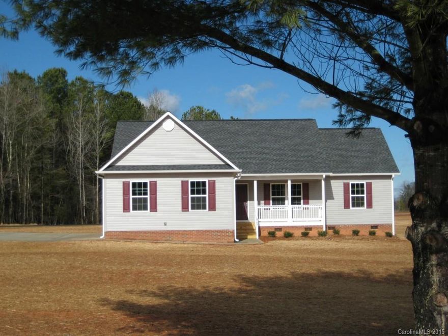 Vinyl siding ranch w/split bedroom plan, family room w/HW floor, fireplace & gas logs, kitchen w/HW floors & black appliances, formal dining room w/HW floors, breakfast area w/HW floors leads to deck, master bedroom w/tray ceiling & walk in closet, 1.45 acre lot. Home to be completed mid January 2015
