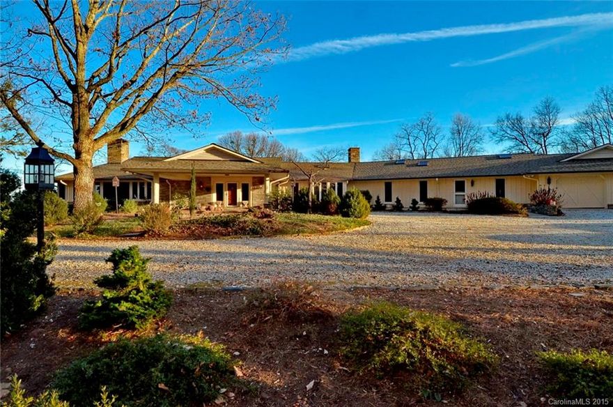 Fabulous 3BR, 4.5BA home on 26+ acres. This spacious & gracious home with large rooms and a flowing floor plan has sweeping views from every room and grounds that are graced with mature trees & stone wall accents. The house has approx. 6,000 sq. ft of living area w/numerous outside seating options. In addition there is a pool, pool house and an additional 2 car garage with 2 stalls and approx. 600 sq ft of heated living area and fireplace. 6+ acres of fenced pasture and located on FETA trails.