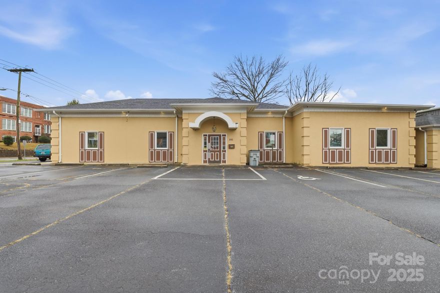 PRIME COMMERCIAL OPPORTUNITY IN THE HEART OF DOWNTOWN LENOIR! Professionally renovated inside & out, this 2700+/- sq ft building is turnkey & ideal for professional services such as attorney offices, medical practices, accounting firms, consulting operations, and similar business uses. No detail was overlooked in this top-to-bottom renovation. Recent updates within the last few years include new HVAC, roof, LVP Flooring, interior/exterior paint, upgraded lighting, and a refreshed layout designed for efficient workflow and client comfort. The interior features a welcoming entry/waiting area, two conferene rooms, multiple administrative areas supporting at least 4 private offices, a kitchenette, 2 bathrooms, storage rooms & closets, plus a separate storage facility out back. Other features include audio/video setup and an alarm security system. With excellent visibility, easy access and strong curb appeal, your growing business will thrive. Rare opportunity in a highly desirable location within walking distance to all of the downtown small businesses, restaurants, municipal buildings & more. A wonderful way to become a intregal part of the community.