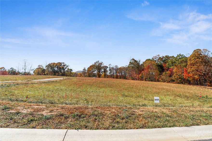 Easy to build on lot in a beautiful BRAND NEW 33 lot development with a nicely paved street that ends in a charming cul-de-sac, so you get no thru traffic. Power and Woodfin water are already in the community and this particular lot has perked for a 3-bedroom septic-making your building process drastically simplified with much of the leg work already complete! Super location with the grocery store and several dining options nearby and you get to enjoy enchanting views of the French Broad River as you make the short drive to vibrant downtown Asheville that offers the best cultural, artsy & culinary scene this area has to offer. With such an attractive opportunity, this is the spot you've been waiting for to build your DREAM HOME! Several lot options to choose from, come see them today! No restrictions against STR's.