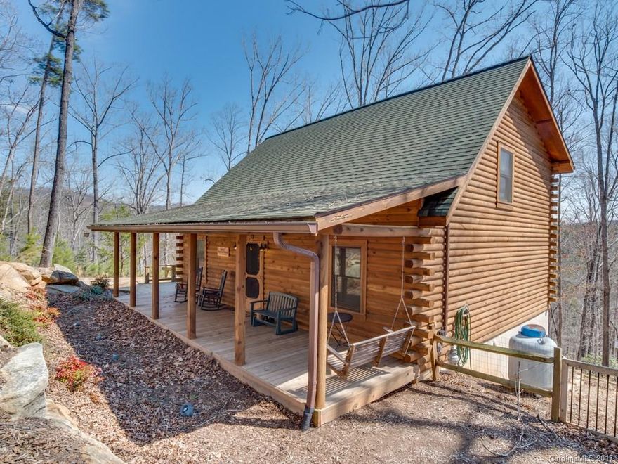 Custom log cabin with rental history. Spacious loft area used as 3rd bedroom. Open floor plan with vaulted ceilings. Winter mountain views and is located on a quiet and secluded cul-de-sac in the gated subdivision of Riverbend. Cabin can be sold furnished with acceptable offer.