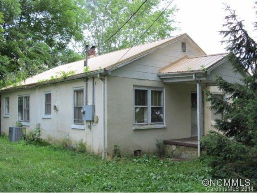 2 bedroom, 1 1/2 bathroom home, minutes from downtown Brevard, nice level lot, mature trees, home in need of some TLC, being sold as is, large dinning room