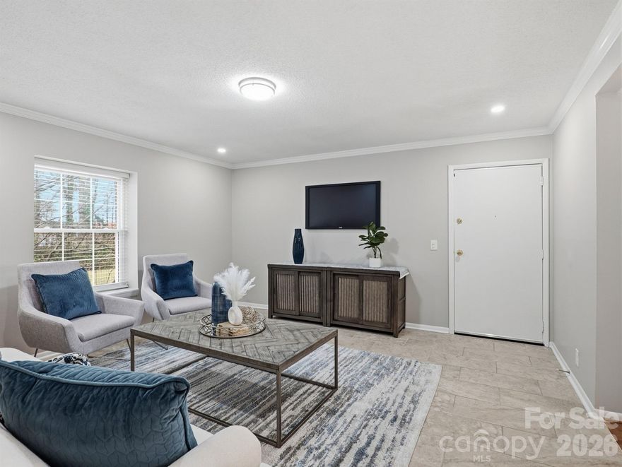 Convenience at your fingertips! Very desirable second level three bedroom condo in the Dilworth/Sedgefield area. The generously sized living room features attractive tile floors, that match the kitchen tile, new lighting and opens to the dining room with hardwood floors. The kitchen has been updated with newer cabinets, tile floors, appliances, granite countertops and includes an inside washer and dryer. The two full baths have been updated with newer vanities, mirrors, and tile floors. The covered porch, accessed through the sliding glass door at the dining room, overlooks the courtyard and includes an outside locking storage closet. Whether sipping coffee on your covered porch overlooking the courtyard or entertaining in your new place, you will enjoy the spaciousness and convenience this condo offers. All bedrooms have ceiling fan/light combinations. The condo has been recently painted and is move-in ready. Walk to shopping, restaurants, to a nearby walking trail or enjoy the inground swimming pool on a hot summer day. This location is minutes from uptown, Freedom Park, East Blvd and Park Road Shopping Center to name a few. You can't beat this home for the convenience, price and all of the nearby amenities!