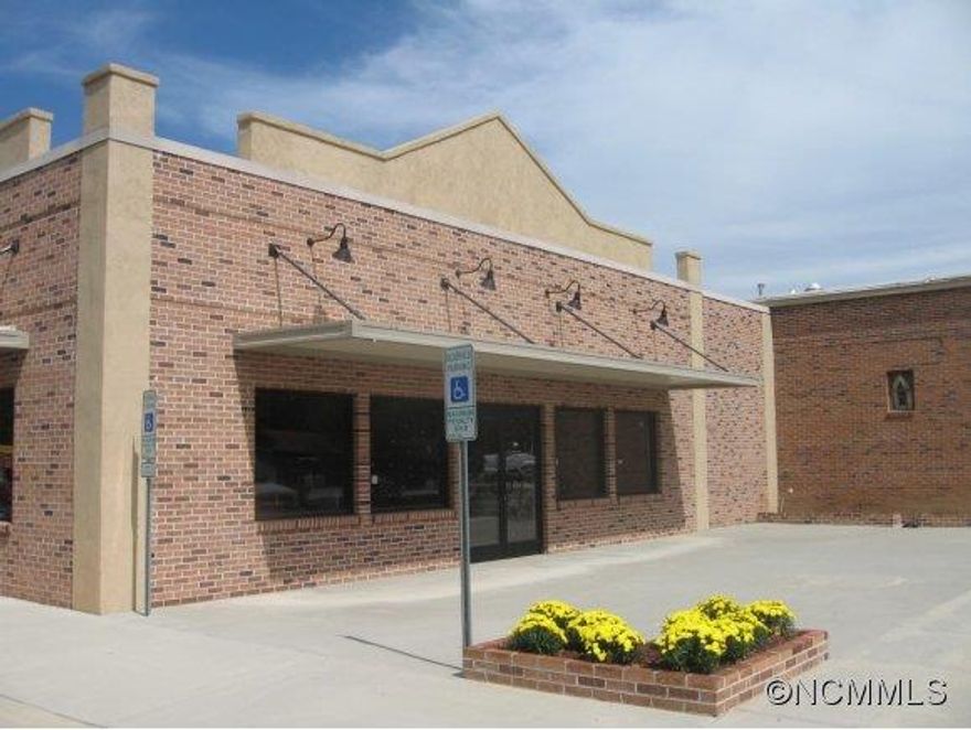 Awaiting the perfect tenant for this incredibly located space on busy corner.  Originally designed for restaurant with patio seating, grease trap, seperate utilities and roughed in bathrooms.  Could be retail or office.  Other tenants are "Your House of Flowers" and "Smokey Mnt Vet Clinic".  Priced $9 - $15 per square foot, depending on upfit allowance.  This is a "win-win" location.