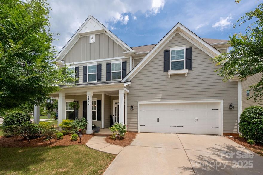 This one is a special home with so much to offer!  Enjoy the open feeling created by the tall ceilings and arched doorways, and the beautiful flow of the floor plan.  Wood floors flow through the downstairs.  Granite counters in the kitchen, including a large island and light cabinetry.  Lots of windows to let in the natural light. A bedroom and full bath downstairs make a great in-law or guest room.  Worried about having enough storage?  Check out the huge owner's closet, multiple walk in closets and so much cabinet space in the kitchen and baths.  A privacy fence around the level back yard and tall trees will give you a feeling of privacy and makes a great place to entertain or play.  Walnut Creek offers miles of sidewalks as well as too many amenities to list.  A quick drive gets you to downtown Waxhaw to enjoy the shops, restaurants, parades and festivals.  You won't want to wait to see this!