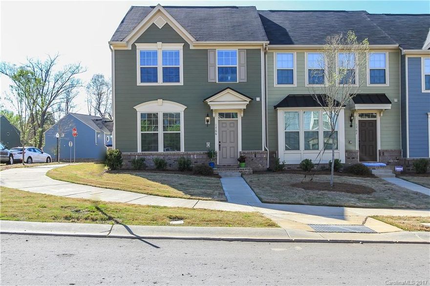 Beautiful end unit located just 3 miles to uptown Charlotte! This unit also comes with a rare 1st floor office.  Scraped hardwood floors throughout first floor, except in office.  2" blinds throughout.  Kitchen offers espresso cabinets, granite countertops, SS appliances & gas stove.  Master bedroom has walk in closet and deluxe master bathroom.  Master bathroom is equipped with dual sinks, garden tub, separate shower and tile floors.  The townhome has been recently painted.