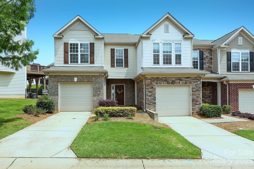 Beautiful end unit in Park South Station! Open floor plan and wooden floors throughout the main level. Beautiful kitchen with granite counter tops. Home is abundant with natural light. Primary bedroom with vaulted ceilings and a primary bathroom with double vanity and a walk in closet. Another full bath in the hallway along with the laundry closet compliment 2 sizeable bedrooms. This home comes with all the convenience that Park South Station has to offer! Pool, fitness center, dog park, playground, and greenway trails. Neighborhood and community are gated. Located near shopping and restaurants at Southpark Mall and Park Road Shopping Center, as well as a short drive to Uptown. This location has everything to offer!!