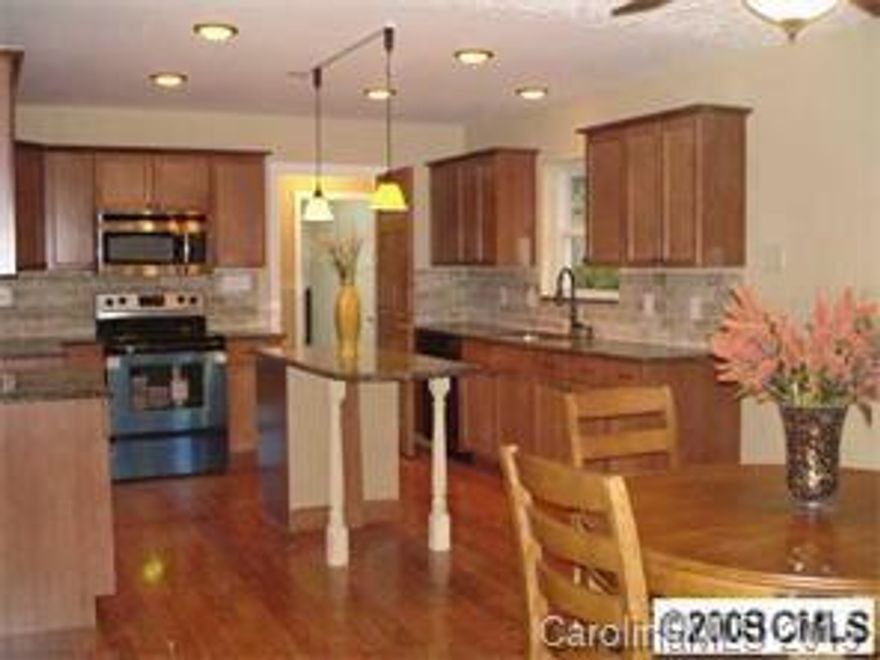 BACK ON THE MARKET. Taken off the market for a few months. Totally Remodeled..a gem in the finding. Outside of the house is being painted  week of Feb. 22nd. Large kitchen: granite countertops, subway style tumblestone backsplash, center island. All 3 baths beautifully remodeled. Large Bonus/recreation room or can be converted to 4th BR.Refinished hardwood floors,new windows, recent heat and air systems, great workshop/or art studio in back yard with electric, private yard. New landscaping.