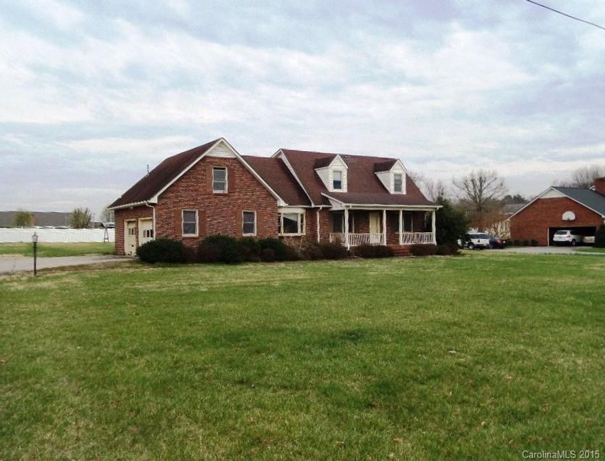 All brick home on 3/4 acre lot in desirable East Rowan neighborhood.  Convenient to shopping, dining, and schools.  Oversized 2 car garage, living rom with fireplace, rocking chair front porch and patio for entertaining.  Large rooms and lots of potential.  This home needs TLC, but will make the right buyer a great home!  The sale of this property is made on an "As Is", "Where Is" and "with All Faults" basis.  Please see attached media section for disclosures.