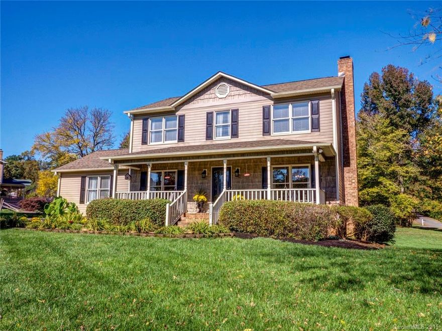 Hardwood floors throughout. Granite countertops. Downstairs guest suite. Master bathroom previously showcased on Lowes.com. Corner lot. Wisteria-covered pergola. Koi pond. Tankless, Rinnai water heater. Is your checklist full yet? It should be, because this is every buyer's dream home and you won't want to let it get away.