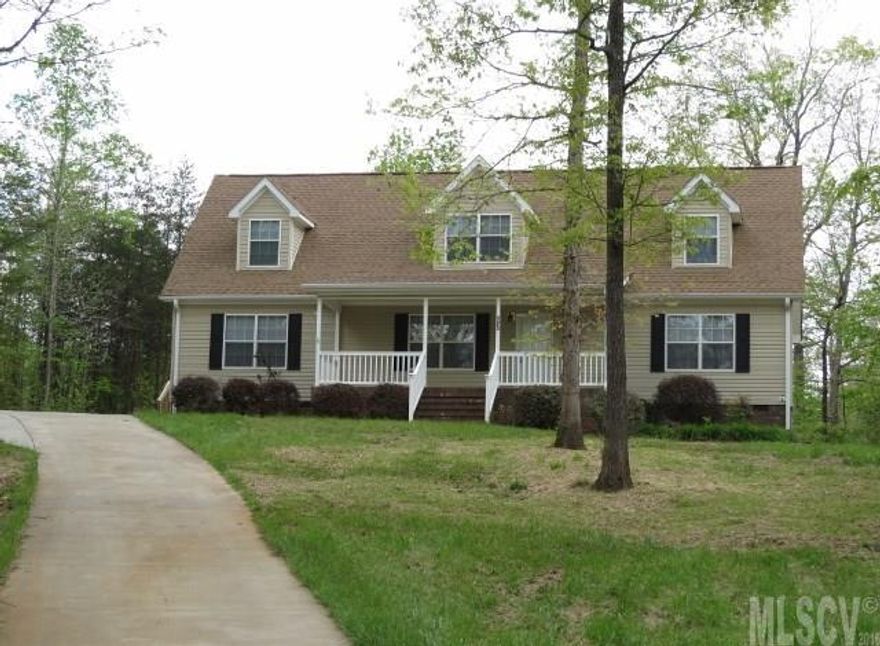 Want privacy? Here it is! Beautifully positioned home on 1.5 acres on a cul de sac lot with trees surrounding.This spacious home offers wood flooring, a large living room and a beautiful kitchen which connects to the dining room. The master bath includes a large tub, separate shower and dual vanities and opens to master bedroom with double doors.Large front porch provides space to enjoy the serenity of the outdoors. Upstairs is unfinished, so much opportunity here to make this house your own!