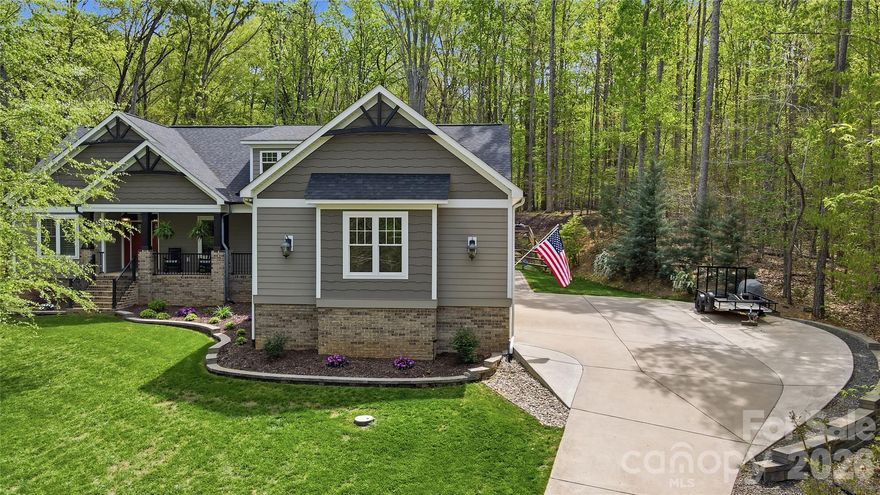 Custom ranch home on 3.52 acres in Concord, tucked away on a private cul-de-sac with a long concrete driveway, 3-car garage, and fenced backyard.

Inside features plantation shutters throughout, an epoxy-coated garage floor, and a spacious family room with faux wood beams, custom built-ins with storage, and a gas fireplace. Crown molding runs throughout the home. The kitchen offers a gas range, custom hood vent, oversized pantry, and a large island, with a separate office space as well.

The outdoor space is truly something special. Designed for both everyday living and entertaining, you’ll find a custom wooden pergola with stacked stone columns and a gas fireplace with remote, along with a patio finished with custom pavers. The backyard is lined with cut boulders creating a natural retaining wall across the entire space, plus a screened-in porch overlooking the pool and a hot tub for added relaxation.

The saltwater pool includes a boulder waterfall feature and a brand new gas heater, making it easy to enjoy throughout more of the year.

This property offers a rare combination of space, privacy, and thoughtfully designed indoor and outdoor living areas, making it easy to enjoy every part of the home.