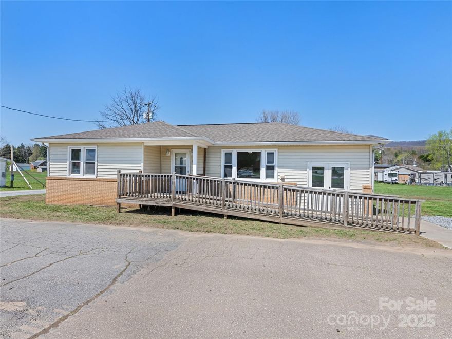 Completely renovated Home or Office in Commercial District of Clyde. Multiple uses for this one level home include commercial office, lease/rental investment income or family home. Walking distance to all town amenities and utilities. Depot street has been closed and is now part of this property and increases the acreage to approximately .469 acres by survey...The home was completely cleaned and remodeled with Laminated floors, Oak Kitchen cabinets, Countertops and Bathroom fixtures. New utilities and Heat pump. Easy year round access with disability ramp entrance and Workshop.