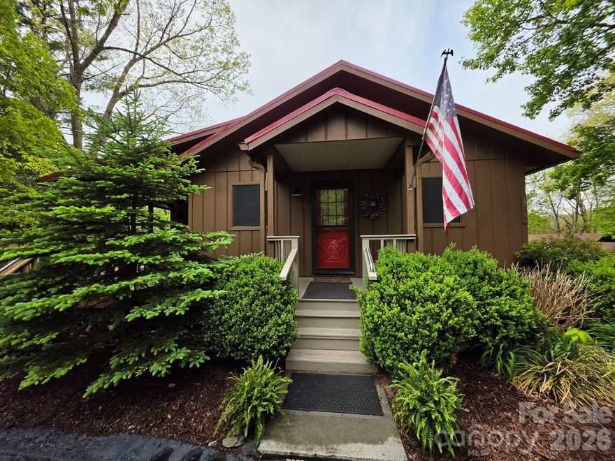 Simplify your life with this move-in-ready, year-round mountain home in Linville Land Harbor’s Mountain View neighborhood. The home offers 3 bedrooms, 2 bathrooms, a great room with a gas-log fireplace (not in use at this time) that can be converted to a wood-burning fireplace, and a sunroom for dining, an office, or a craft space. The kitchen features custom wood cabinetry, granite countertops, and stainless-steel appliances. Enjoy a covered, dog-friendly deck. The lower level includes a third bedroom or flex room (currently shown as a family room), a laundry/mudroom, and a half bath. The 2-car garage provides extra space and a separate golf cart parking area. Upgrades include a leaf-filter gutter system with a lifetime transferable warranty and Mitsubishi mini-split units. The exterior was painted with Rhino Shield, offering a transferable 25-year warranty, and the interior was recently painted. The circular driveway, along with a second driveway and garage, provides ample parking. There is space to store a travel trailer or smaller RV on the lower level of the lot. The garden is well-established. Linville Land Harbor offers amenities such as golf, a clubhouse, a game room, seasonal recreation, pickleball, tennis, trails, dog parks, a pool, trout fishing, and a lakeside beach. The POA covers water, sewer, trash, cable, and Wi-Fi. Experience exceptional mountain living.