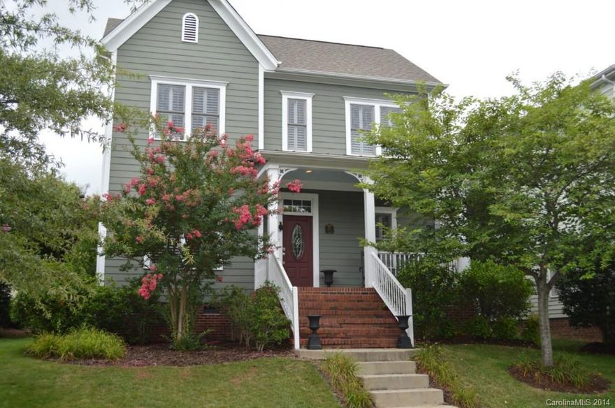 3BR/2.5BA Baxter Village on beautifully landscaped lot. Open floor-plan home is loaded with custom tile work and plantation shutters.  Formal dining room w/ kitchen opening to great room & den (office). Upstairs has loft area, master & 2 secondary bedrooms. Fenced backyard w/ gate that gives access to attached two car garage with beautiful backyard.