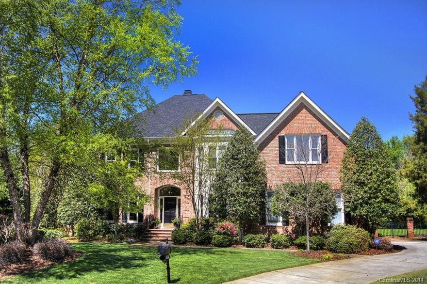 Bright and beautiful 5-BR custom full brick on cul-de-sac lot in popular Providence Springs neighborhood features a fabulous lush, professionally landscaped yard with pool and spa. Updated kitchen includes cherry cabinets, granite countertops; updated master bath with whirlpool tub and heated floors. MASTER ON THE MAIN LEVEL. Large secondary rooms and lots of storage. Myers Park High School zone.