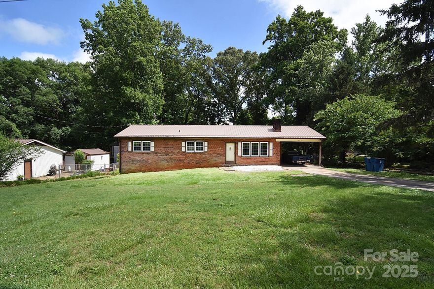 This solid all-brick home is full of character and ready for a new owner to make it shine. Featuring three bedrooms, two fireplaces, a full basement, and a durable metal roof, this home offers a fantastic opportunity for those looking to add their personal touch. Situated on a spacious lot with a fenced backyard—perfect for pets, play, or entertaining. Conveniently located near Hwy 321 with easy access to Newton, Conover, and Hickory. Appliances are included, no city taxes and the property is priced to sell. Don’t miss the chance to turn this hidden gem into your dream home.