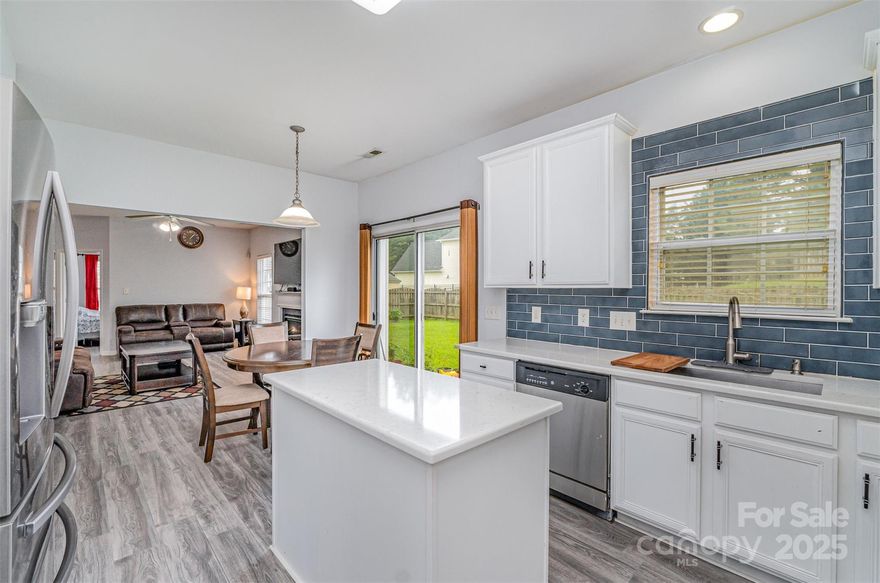 Welcome to Oakdale! This spacious 4-bed, 2.5-bath home offers over 2,300 sq ft of comfortable living. The main floor features an open concept layout with a bright living room, dining space, and a cozy fireplace. The kitchen is equipped with modern appliances and plenty of cabinet space, perfect for everyday living and entertaining. Upstairs, you’ll find a generous primary suite with a walk-in closet and private bath, plus three additional bedrooms and a full bath. Enjoy outdoor living with a flat backyard and patio, ideal for gatherings or relaxation. A 2-car garage and driveway provide ample parking. Conveniently located near I-485, I-85, and Uptown Charlotte, with shops, restaurants, and parks just minutes away. Move-in ready and waiting for you!