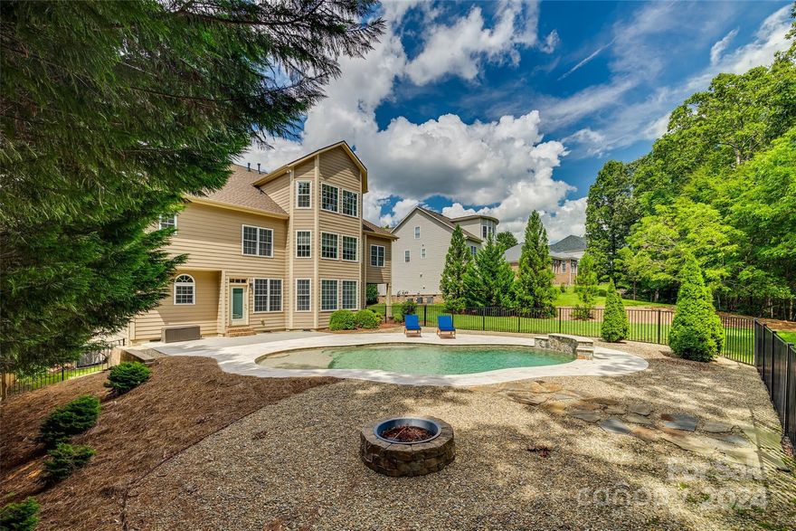 This John Wieland built home has an awesome pool & sits on a great private lot backing to the woods w/ lots of nature to watch as you relax in the backyard oasis! Come inside the 2 story foyer to see the nice open space featuring a flex area that's great for an office & opens to the dining room & pass through to the Kitchen. The large kitchen has tons of cabinet and counter space that's great for the home chef! The kitchen opens to the Breakfast area & flows right into the Family room w/ 2 story windows & gas fireplace surrounded by built-ins. Head upstairs to the massive Primary Suite w/ Huge tray ceiling and the nicely updated Primary bathroom w/ multiple custom closets. There is a 2nd bedroom w/ ensuite, 2 more bedrooms w/ Jack and Jill bathroom between, & the laundry room on the 2nd level. The 3rd level offers a 5th bedroom or bonus room space w/ a full bathroom and 500+ additional sq ft of unfinished walk-in storage. There's also a nice side porch to relax on when not in the pool.