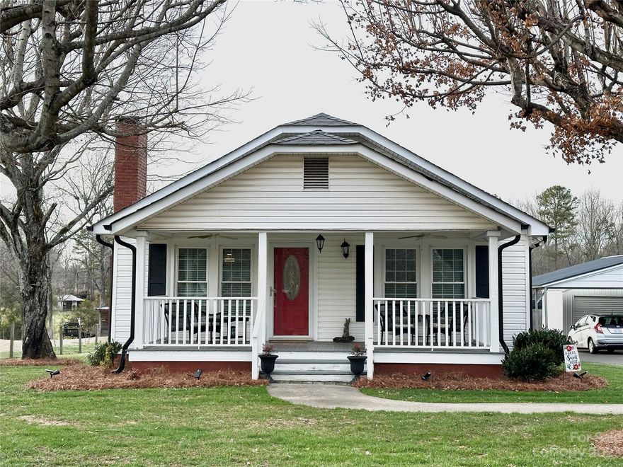 Welcome home to the cutest bungalow ever!  Once you step over the threshold you will immediately notice the newly finished, gleaming hardwood floors and the unblemished walls. Enjoy curling up in front of the fireplace with insert & warmer with a cup of hot cocoa. Come through the spacious Dining Room into the Kitchen where you'll find an island to increase your counter space.  Both bedrooms are amply sized, bright & cheery with plenty of closets. Through the Kitchen there is a 20x20 addition that has begun to include an additional bedroom, bath, and laundry. This addition has been roughed in but the duct work has not been added to this portion. Once finished, you'll have yourself some equity.  Upgraded septic for a 3-bedroom. There is a great wooden deck, three-car carport, storage building, and an awesome big backyard to play in that is partially fenced. Here is your chance to buy the home of your dreams with close proximity to downtown Concord and Mount Pleasant.