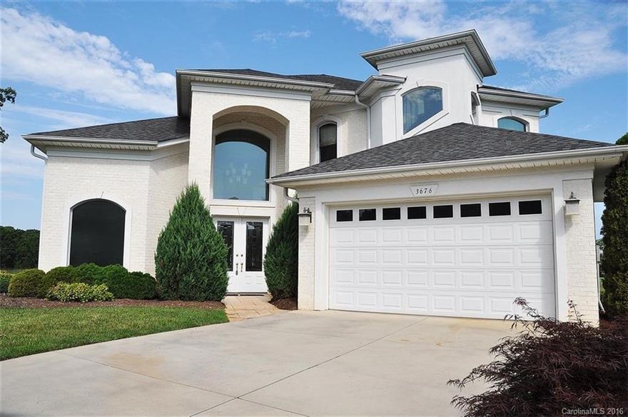 Fabulous Boral brick custom home in pristine condition. Perfect for entertaining w/ 2 story open floor plan, upstairs sanctuary w/ spectacular view of golf course. Kitchen features custom cabinets, double dishwasher & bar area w/ bar sink & icemaker. Spacious master suite w/ French doors to patio, huge custom walk-in closets & marble master bath w/ walk in shower, garden tub & 2 vanities. Porcelain tile throughout main living area & kitchen. Patio overlooks golf course. This home is a showplace.