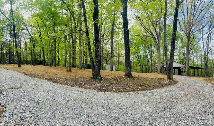 BACK ON THE MARKET AT NO FAULT OF SELLERS. Sellers are motivated! Bring all offers! 

If you are looking for a cleared and ready to go property, look no further. Property has a well (pump replaced in 2022) and septic already installed; which has been inspected, electrical meter is already in place, a carport, storage shed, separate lean to, and a new gravel driveway with 2 entrances. Located at the end of a dead end road, it is sure to give you privacy. This property is a dream as all you have to do is build or bring a manufactured home in.

***The bus has been removed***