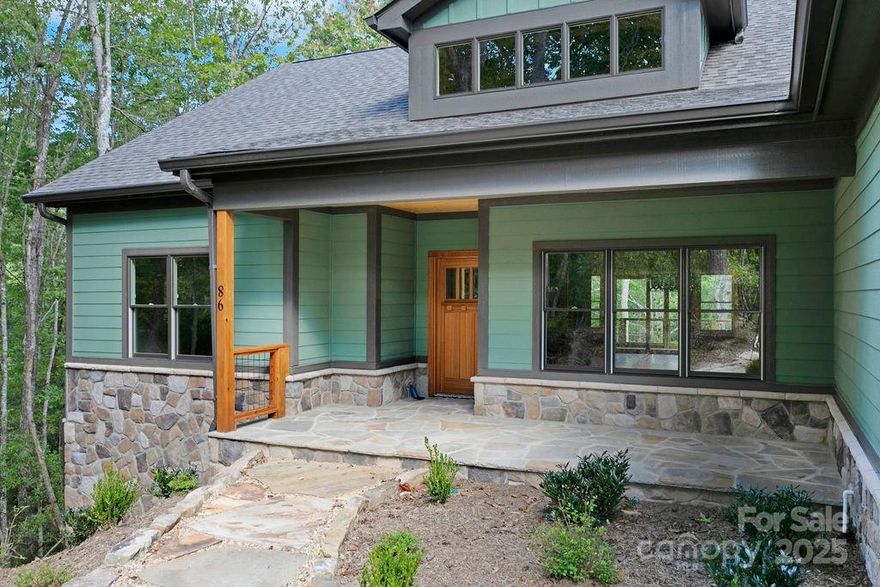 This is a stunning 1 level Crone custom home in the beautiful, gated community of Connestee Falls! This top-of-the-line home boasts 3 spacious bedrooms, 2 baths, a laundry room, pantry, large open floor plane, with a big living room, kitchen and dining area. Exquisite attention to detail includes, custom cabinets, granite counters, top of the line stainless appliances, gorgeous breakfast bar, hardwood floors, and the list goes on and on. It has an attached 2 car garage, large front and rear porches for entertaining and much more. This low maintenance home is nestled in a beautiful, wooded lot. You will enjoy all of the abundant amenities that Connestee Falls has to offer, lakes, fishing, walking trails, dog park, community garden, clubhouse, golf course, tennis courts, swimming pool, pickle ball courts, and etc. This is one spectacular home and it is only minutes from all that downtown Brevard has to offer!