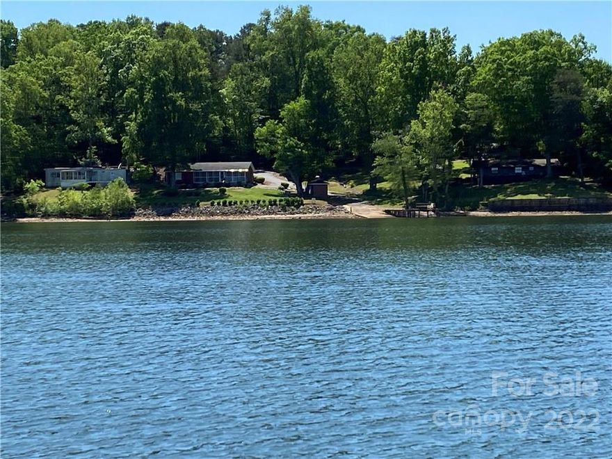 One of a kind Lake Property located on Lookout Shoals Lake. This property features 2.15 acres with 4 dwellings all on one property. Very private with gates at top of driveway. Paved drive with easy access to each unit. These homes consist of a brick home, a log cabin, and manufactured home that is all water front with an additional home located on the property. There is two docks and a boat ramp with easy access into the lake. The views of the lake are second to none and has many feet of water frontage. Plenty of screened in porches and decks that lookout across the water. Many of the homes have new updates. Too much to list. Come and see this once in a lifetime lake property.