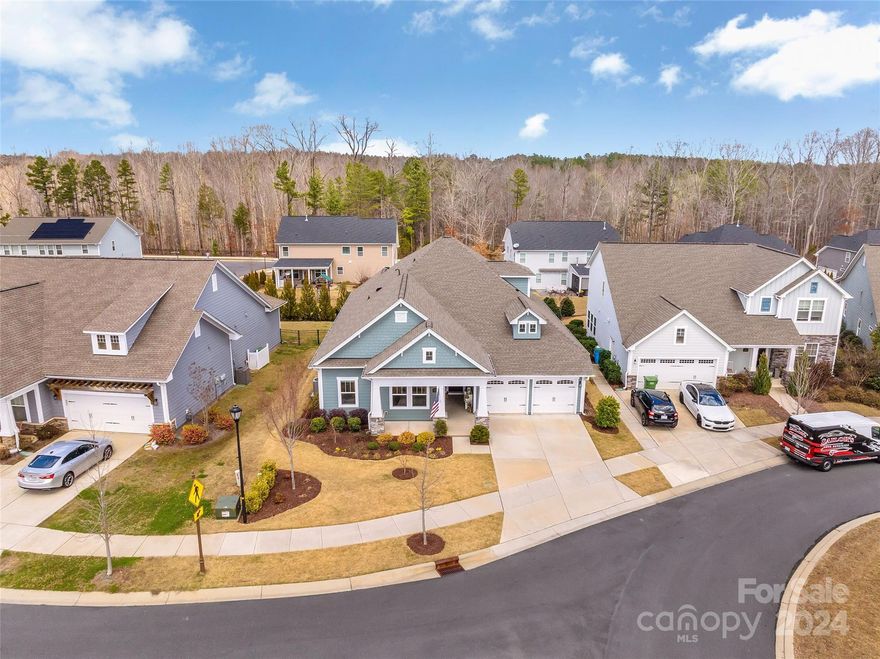 Fort Mill Ranch style home in Massey! Primary Bedroom on Main with tray ceiling. 2nd floor Bonus Room & Full Bath. Open Floor Plan, plenty of upgrades & additional shelving!  Bedrooms 2 & 3, Full Bath, Office, Foyer, Kitchen, Dining Area, Great Room & Laundry Room on Main. Kitchen with double ovens, 5 burner gas cooktop, granite counters, large island, pantry, stainless appliances & refrigerator conveys. Office has built in cabinetry, granite countertop, shelving & French Doors, great storage or bar. Primary Bathroom has large walk in shower, large closet with additional shelving & water closet. Beautiful covered patio plus additional paver patio for entertaining. Fenced level backyard with landscape steps to the raised garden bed in the lower backyard. Washer & dryer convey.  Beautiful home & ready for a new owner! Fort Mill Schools, verify assigned school due to enrollment freezes. Massey community Olympic size pool, Lazy River, Playground, Fitness Center, Sidewalks.