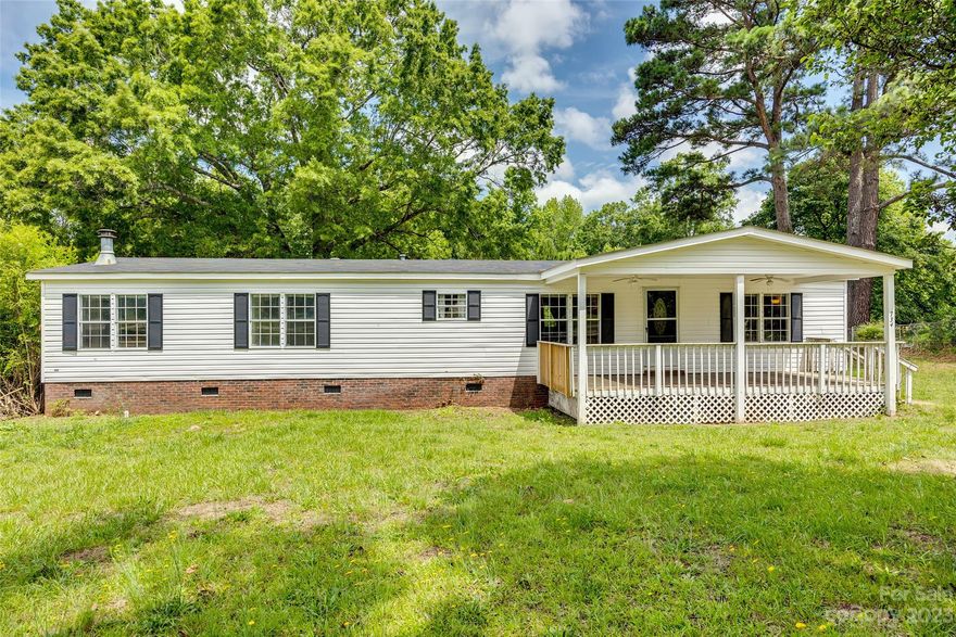 Welcome to this beautiful double-wide home situated on half an acre of land in a serene and quiet neighborhood. Upon entering this home, you will immediately notice the generous living space. The living room has lots of natural light, creating a warm and inviting atmosphere. It serves as the perfect space for relaxation or entertaining guests. The primary bedroom is very spacious it can easily accommodate a king-size bed, additional furniture and it has a walk in closet. A highlight of this property is the bonus room, which can be utilized as a playroom, home gym, media room, or even a home office. The possibilities are endless, allowing you to customize the space to fit your unique needs and lifestyle. Don't miss the opportunity to make this your dream home !