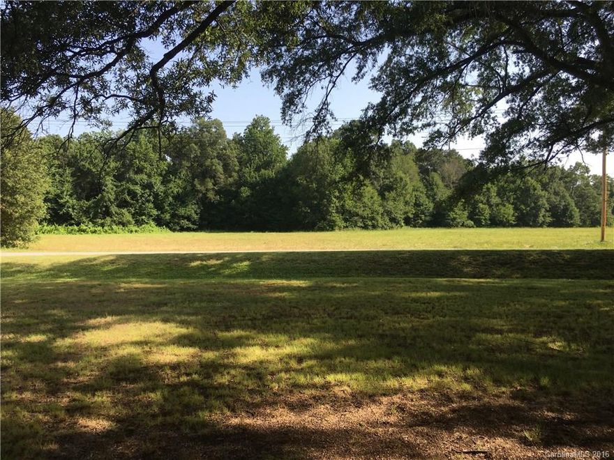 Great building lot, mostly level, open with county water

Soil has been looked at by a soil scientist.  A designed system will be required, most likely a surface drip.  Cost around $35K for system.  Cost to be verified by the buyer and soil scientist.  

PRICE DROP TO HELP WITH SEPTIC! Won't last long at this price.Buyer is responsible for the system.
