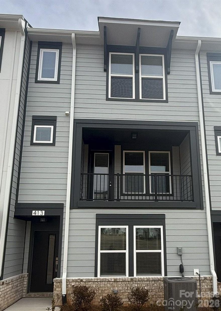 Modern living meets convenience in this 3-bedroom townhome for rent just 2 miles from UNC Charlotte! Each bedroom has its own private bath—perfect for roommates or work-from-home setups. You’ll love being within walking distance to the Toby Creek Greenway, restaurants, and shops, plus two nearby LYNX light rail stops make it easy to get to Uptown, South End, or NoDa in minutes.

The first level offers a 2-car garage and private guest suite, great for visiting friends or a home office. The open second floor is designed for entertaining, with 9' ceilings, a stylish covered terrace, and a seamless flow between the kitchen, dining, and living spaces. The kitchen features quartz countertops, a large island with seating, 42" white cabinets, GE stainless steel appliances with gas range, and modern finishes throughout.

Upstairs, the primary suite includes a walk-in closet and spa-like bath with double sinks and a tiled shower. Durable LVP flooring keeps maintenance low, and laundry is conveniently located on the upper level. Enjoy evenings on the terrace or explore the lively nearby neighborhoods—this home offers the perfect balance of comfort, style, and accessibility.

Private driveway and guest parking available. Ready for immediate move-in!