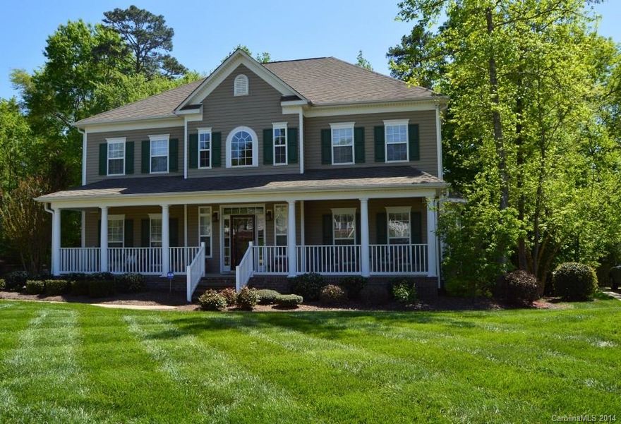 This home is sure to impress! Super clean! Awesome floor plan! Newly painted through-out! Gleaming hardwoods, ceramic tile & more!! Great architectural details. 3 1/2 car garage! Big kitchen plenty of counters and cabinets! Spacious master suite, two closets! Big bonus room! Lots of storage! Rocking chair front porch! Large deck overlooks back yard which is lined with trees, lots of privacy. Professionally landscaped, large patio extending below deck, even a stone fire pit! FREE HOME WARRANTY!