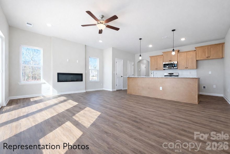 Great Incentives being offered to buyers on this end unit!  Welcome to Abershire. This home is MOVE IN READY. It is a beautifully designed 3 bedroom townhome with a thoughtful layout and upscale finishes included in the price. This is our popular Whitley plan AND features a large kitchen island that overlooks the main living, dining, and flexible space—perfect for entertaining and everyday living.  Homes feature timeless selections with soft grays, crisp whites, and natural wood tones throughout. Luxury vinyl plank flooring runs through the main living areas, all full bathrooms, and the laundry room for both style and durability. Upstairs, you’ll find spacious secondary bedrooms and a conveniently located laundry room, making daily routines effortless.   Each townhome includes a 16-foot privacy fence separating units, with potential HOA approval to extend fencing after purchase—allowing homeowners to create an even more private outdoor space. A perfect blend of modern design, transparency in pricing, and low-maintenance living—Abershire offers style, comfort, and value in a brand-new community. All of the homes are representation photos.