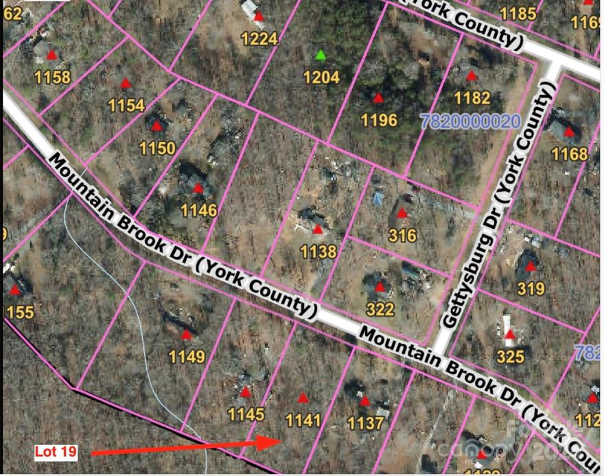 Impossible to find Double Wide approved in York County.  This lot is basically level and wooded.  Well and Septic needed.  Will not last.