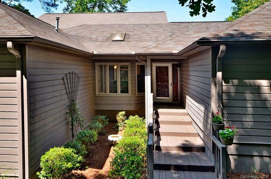 Long-range Mountain Views, privacy, immaculately kept home, open floor plan, split bedroom plan, screened porch and sunroom, recently remodeled, hardwood floors, granite counter tops, Required Social Membership $100/mo. includes htd. pool, spa, tennis, pickle ball, bocce ball, social activities. Cummings Cove Golf & Country Club is in the Top 50 Master Planned Communities in the United States. Pvt. Sewer Utility $38/mo.