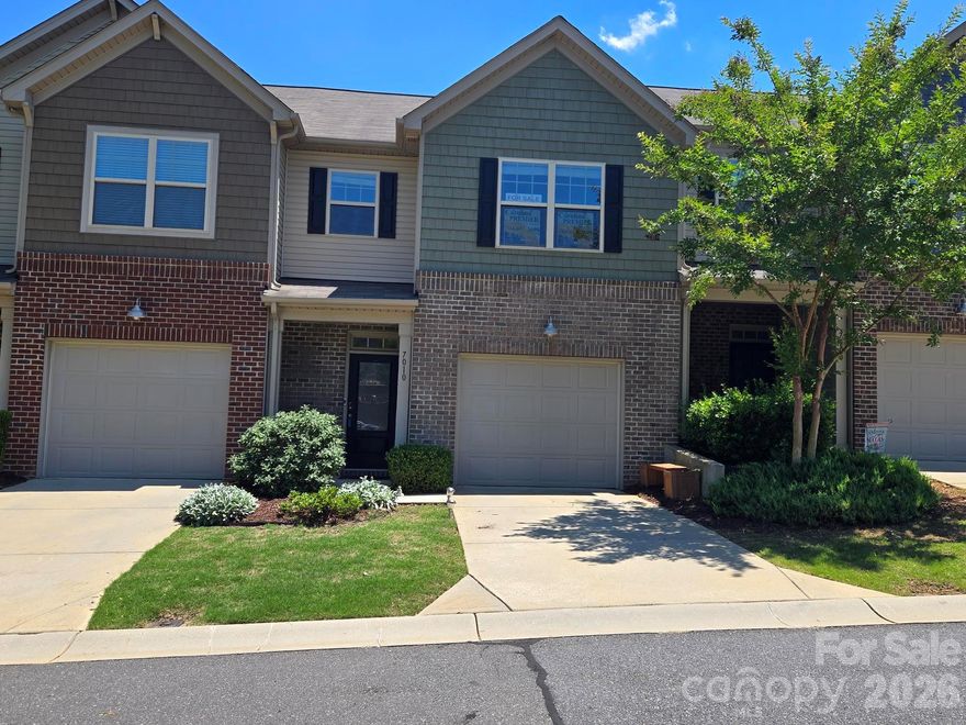 Location, Location. 7010 Swamp Chestnut Lane in Indian Land, SC!  Great open kitchen has large granite island with sitting bar. Stainless appliances, include refrigerator, gas cooktop, built in microwave and dishwasher. Large pantry and tons of cabinets. Entertaining will be a dream with the open floorplan to the family room with a gas fireplace, large windows and access to the large screen patio overlooking your rear yard that is maintained by the HOA. Home has 2 Bedrooms/2.5 Baths. Each bedroom has its own private bath and walk-in closet. The primary suite has a luxury bath with separate garden tub and shower. The laundry room is located near the bedrooms. Washer and dryer to remain. One car garage and driveway. Garage floor has an upgraded concrete floor coating surface. Street parking also available. Large park area with benches available directly across from the home. Located close to many great restaurants, shopping and entertainment. A new Costco and Target recently opened in Indian Land! 100% USDA buyer financing may be available for qualifying buyers! Buyers closing costs can be paid by the seller if needed. Ask for more details.