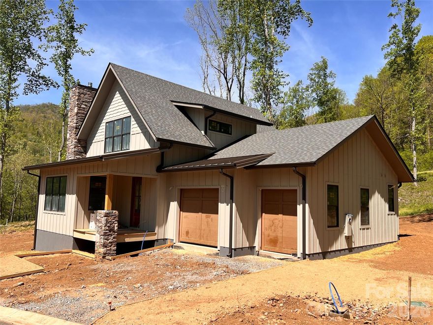 Tucked in the heart of Western North Carolina, Bentgrass Village at Springdale offers the perfect blend of mountain serenity and modern comfort. This new neighborhood is part of the established Springdale Resort community known for its breathtaking golf course and relaxed resort-style living. Each three-bedroom home includes a spacious garage plus a dedicated golf cart bay, all designed to make life here as simple as it is beautiful. 

Surrounded by long-range mountain views, the community enjoys close proximity to the iconic Blue Ridge Parkway and the vast trail systems of Pisgah National Forest, offering endless opportunities for hiking, exploring, and enjoying the outdoors.  

Residents also benefit from seamless golf cart access throughout the resort, making it easy to reach pools, fitness facilities, and year-round dining.  With Asheville just a short drive away and every amenity close at hand, Bentgrass Village is where scenic living meets everyday convenience.