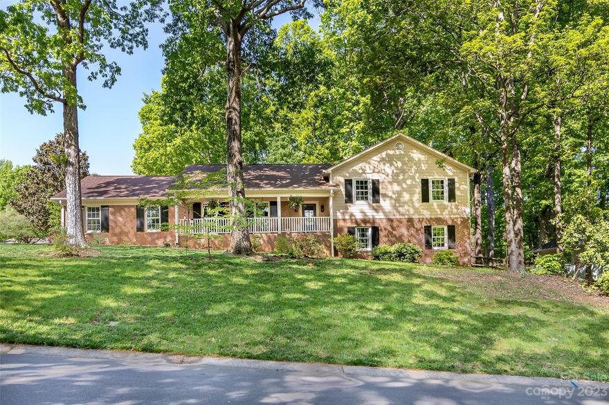 Price improvement in Stonehaven! This home was lovingly updated in 2021 and offers almost 2700 sf of living space, with an additional 735 sf of garage. The main level is well appointed with an open kitchen surrounded by living room and dining area. Light floods into this space from the back sunroom, with updated cork flooring. The kitchen is a chef's dream with a Kucht 6 burner gas range and Thor range hood. The hardwood floors continue upstairs to the primary ensuite and two additional bedrooms with a full bath off the hall. Downstairs, there is a fourth bedroom, full bath and large den complete with wet bar and cozy wood burning fireplace. Head out the sliding glass door and take in the enclosed private patio. Backyard includes rainwater garden and the property is certified wildlife habitat. Look out for deer, as they love to run through! Stonehaven has two membership swim clubs. Greenway access is nearby as well. Great neighborhood, convenient to Cotswold, South Park and schools.