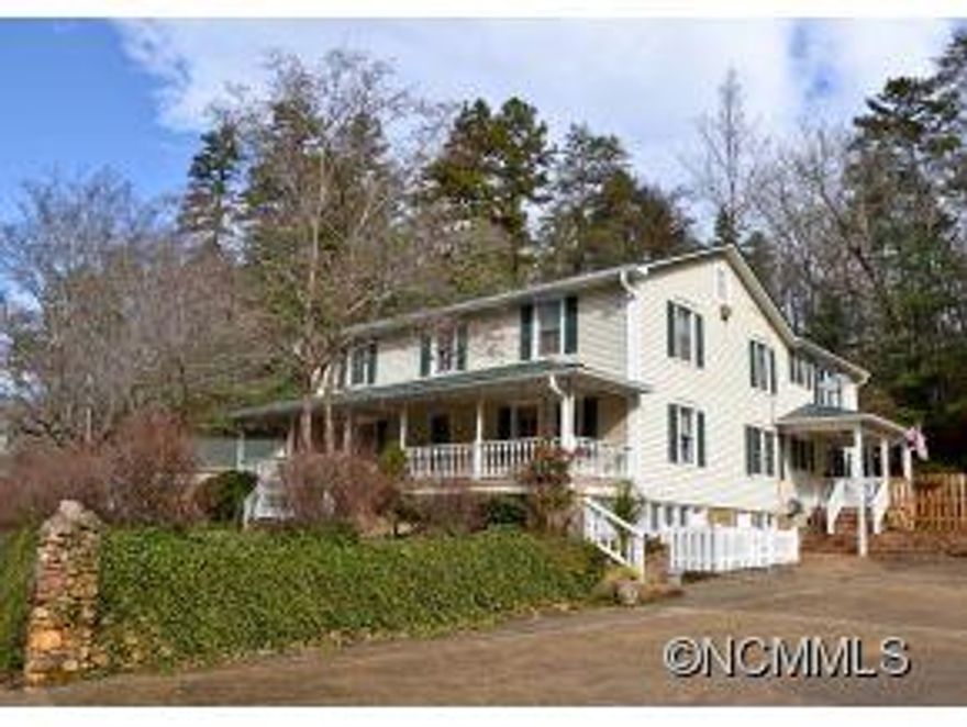 Beautiful farm style home situated on over 4 acres. Located within moments of I-40, Hospital, YMCA and Downtown Marion. The home is upgraded and spaciously expanded over the years. New roof, chimney, sub flooring, flooring, hot water heater & plumbing. 4 fireplaces. Natural spring on property. Lots of closet space. 2-2car garages & and a workshop.