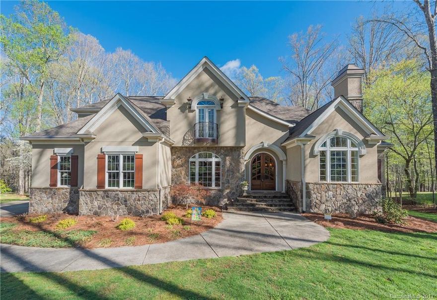 457 Riding Trail Rd. York, SC. This Stunning 2-Story Home w/Walk-Out Basement rests on a Beautifully Landscaped Wooded Lot in Premier Pebble Creek.  Custom built w/Highest Attn: to Detail & Trimmed to the MAX, this Sanctuary offers a Warm Porcelain Floor  upon Entrance, Soaring Beams, Unique Ceilings, Arched Windows w/Transoms for Natural Light, Stone FP’s, MoM w/En-Suite & Chef’s Eat-in Kitchen w/all Extras. Lg Rec Rm for Kids/Adults w/Guest Suite, Storage Galore, NO HOA & Access to Hwy 5 & 161