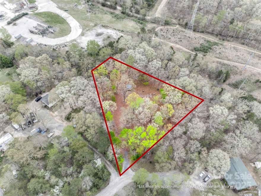 Back on market at no fault to the sellers. *Seller has installed new 1,000 gallon septic tank* This expansive 1+ acre lot is nestled in the peaceful, rural setting of Indian Land, South Carolina. With no building restrictions this property offers a unique opportunity to build your dream home, create a private getaway, or invest in land in one of the area's growing communities.  Enjoy the best of both worlds, as this property offers a tranquil, country atmosphere while being conveniently located near the amenities and attractions of Fort Mill, SC, and the larger Charlotte metro area.