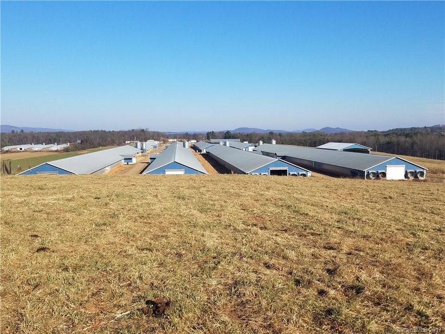 Income producing broiler operation poultry farm with current Tyson contract.  Entire property for sale includes the poultry houses (8) and a truck repair shop, a historic (All Healing Springs) house (residence)-  and a cleared 1.88 ac. lot next to Truck shop.  Included with the 118 acres is a mobile home park consisting of 9 sites.  This property  is a great investment opportunity for a very energetic buyer!!!   The seller will sell the chicken houses and 20 acres seperately.  Call for details